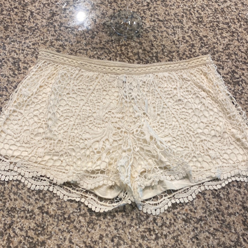 Off-white lace shorts
